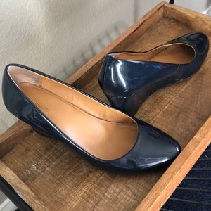Navy blue patent leather wedge heels